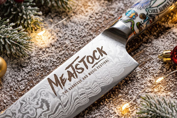 Meister Damascus kitchen knife displayed with festive Christmas decorations