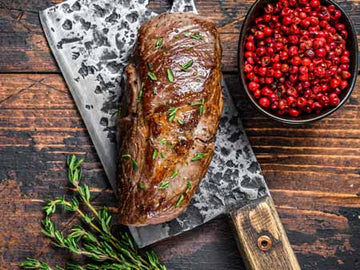 Make tender grilled lamb leg with orange, lemon, garlic, oregano and cumin, then slice thinly for a flavourful BBQ meal.