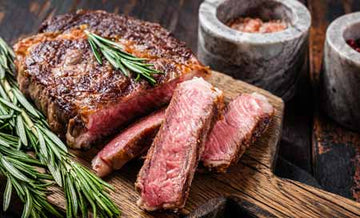 Grilled ribeye steak sliced and ready to serve