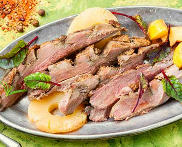 Maple glazed duck breast with wild mushrooms and spinach
