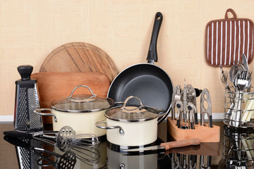 Upgrade your kitchen with must-have accessories: sharp knives, reliable sharpeners, elegant platters, and versatile stainless steel pans.
