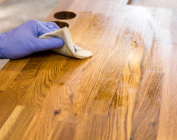 Oiling a wooden chopping board