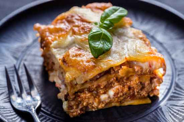 Homemade lasagna with meat sauce, ricotta, mozzarella and Parmesan cheese