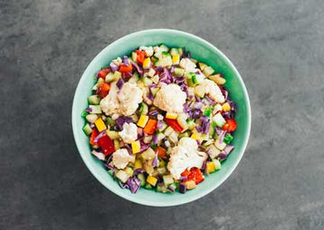 Fresh vegetable salad with tomatoes, cucumber and cabbage