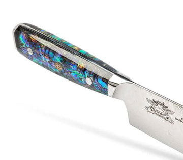 Kitchen knife with a colourful resin handle