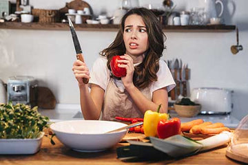 Woman using a kitchen knife