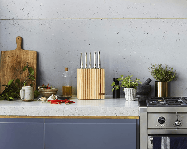 Knife in block for safe and convenient storage, keeping blades sharp and your kitchen organised.
