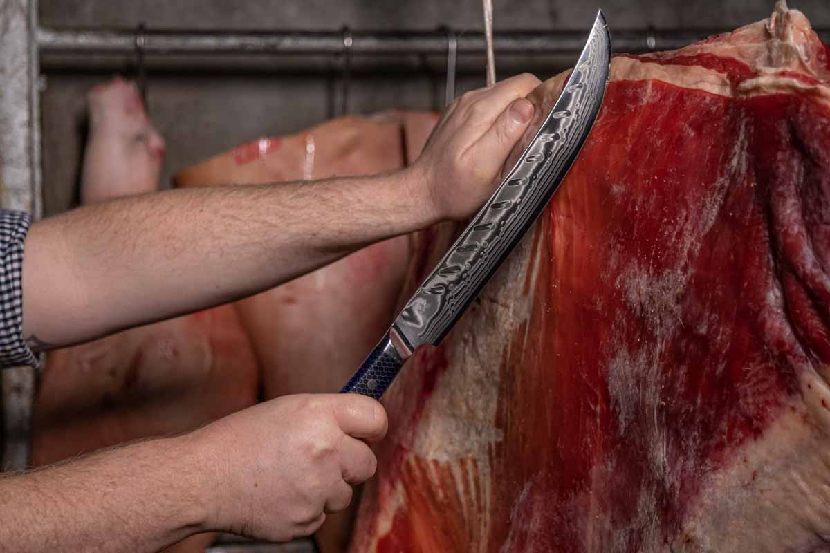 CHEF SUPPLY CO Dark Tessellation Range 25cm Damascus Butcher Knife with Very Dark Blue Two Tone Honeycomb Pattern Resin Handle