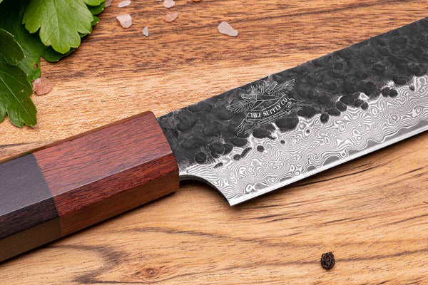 Damascus Steel Knives with intricate patterns, showcasing sharp blades and durable craftsmanship.